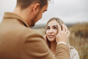 A woman looking at a man she finds attractive